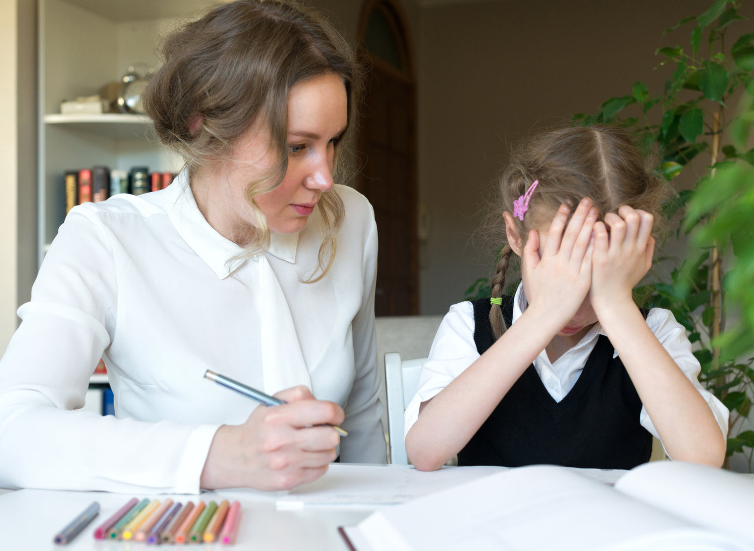 Parent and Child Struggling with School Work | The Good and the Beautiful