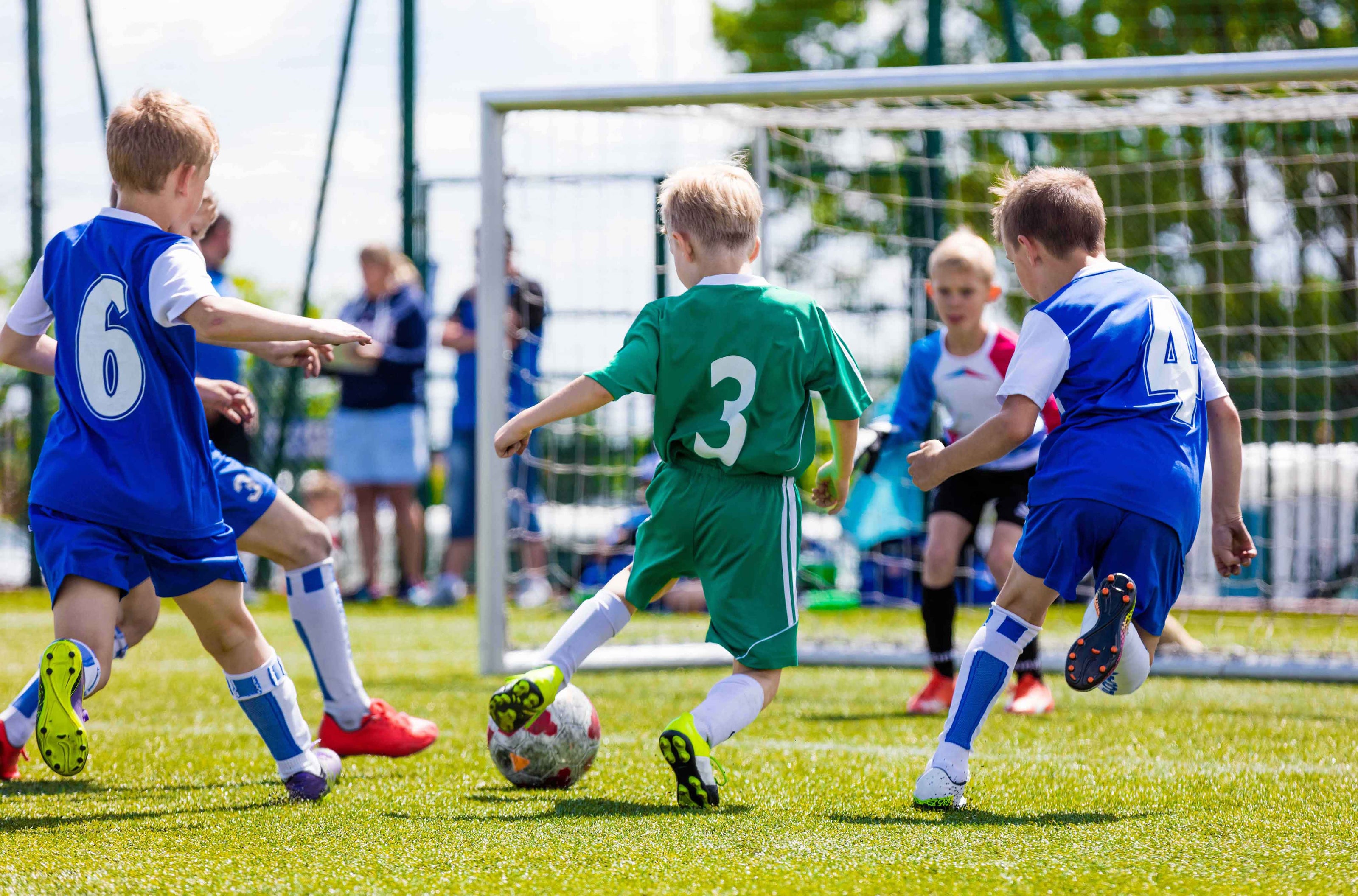 Children playing soccer | The Good and The Beautiful