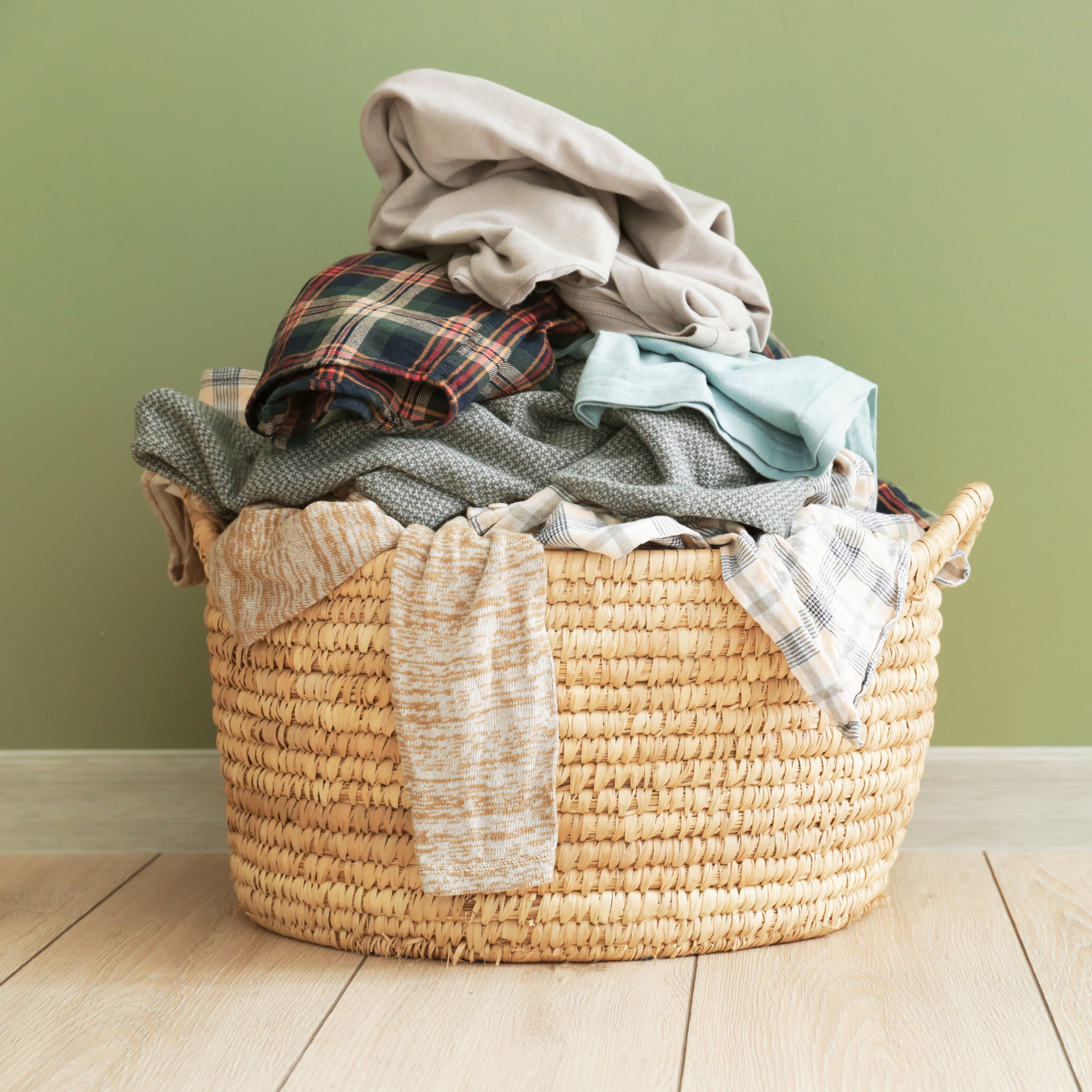A laundry basket full of clothes | The Good and the Beautiful
