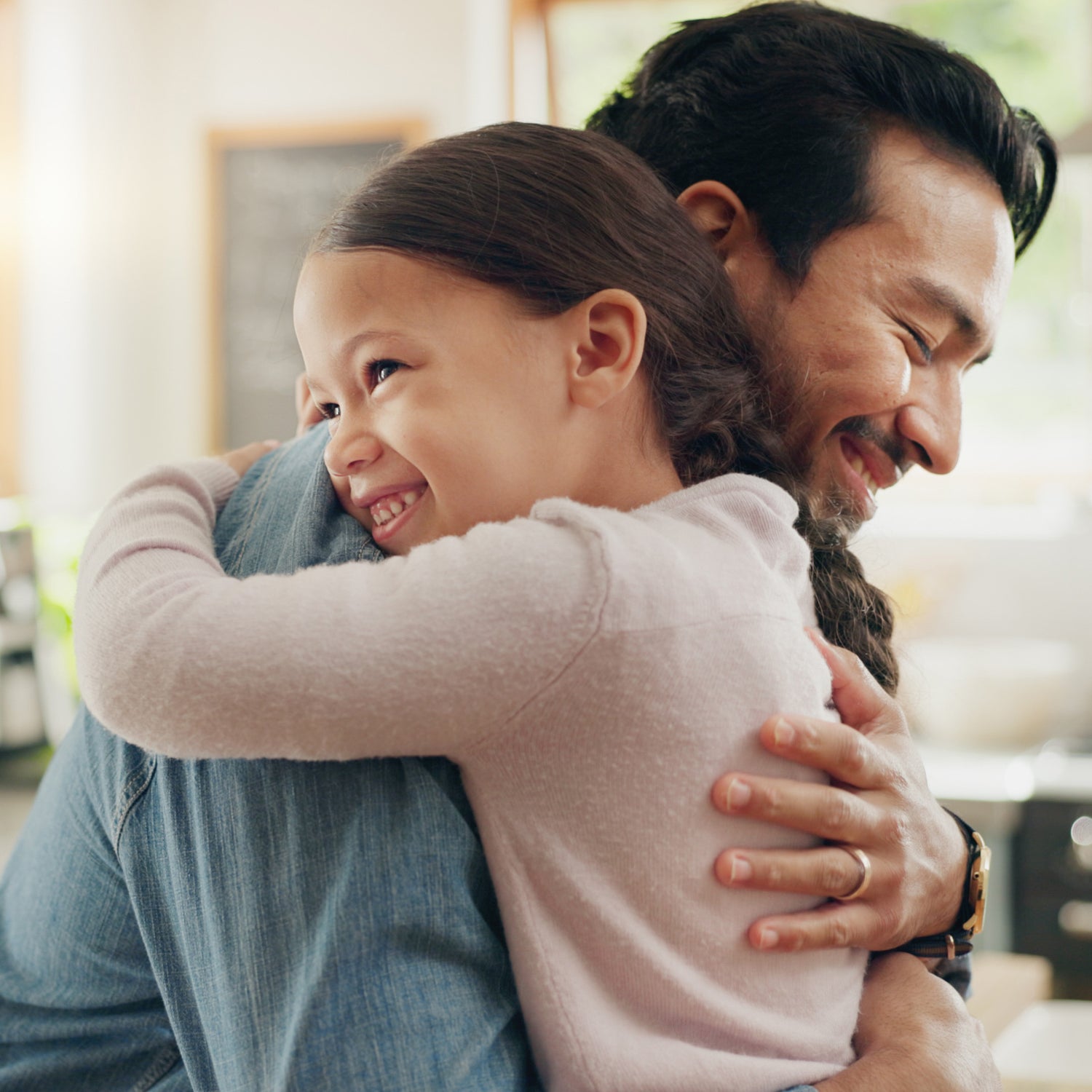 Father and daughter hugging | The Good and the Beautiful