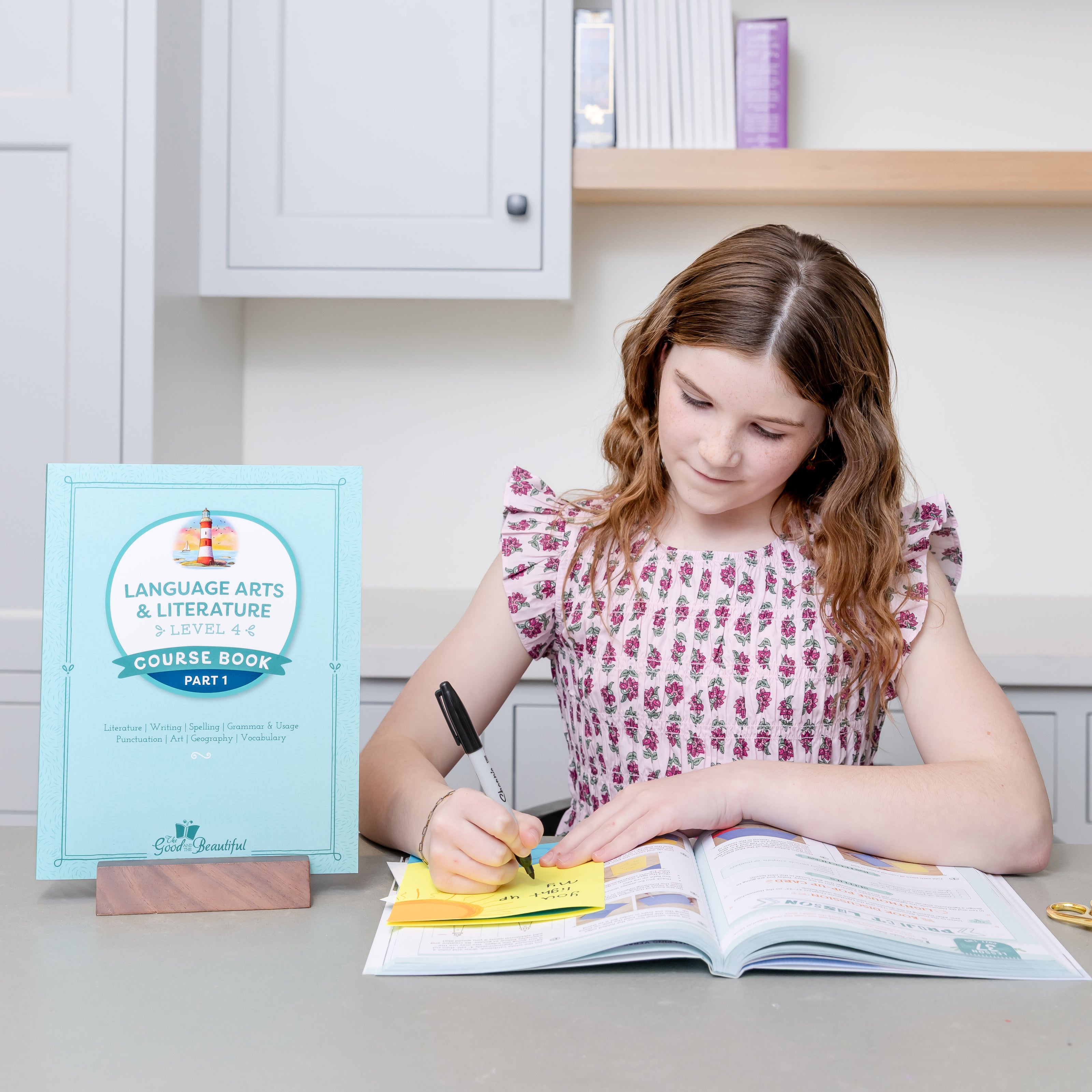 Young girl working on Language Arts Level 4 |The Good and the Beautiful 