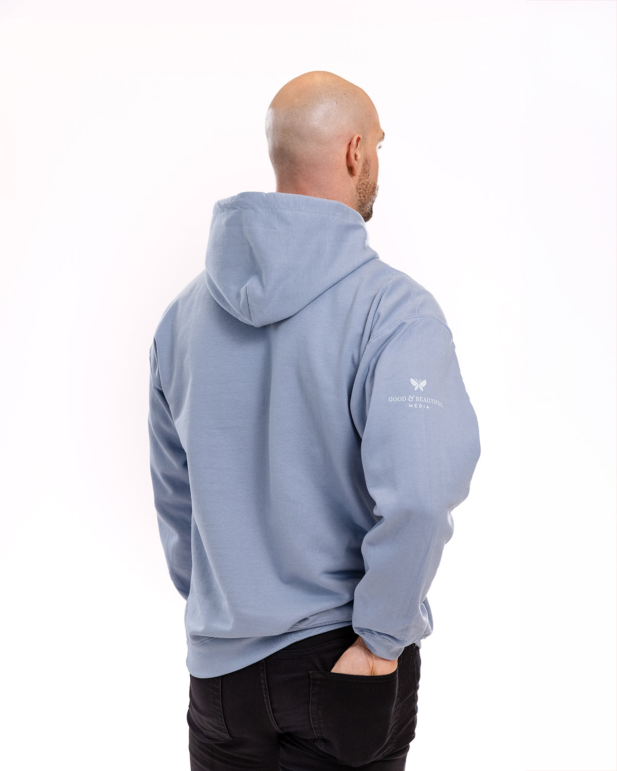 A man modeling a hoodie | The Good and the Beautiful